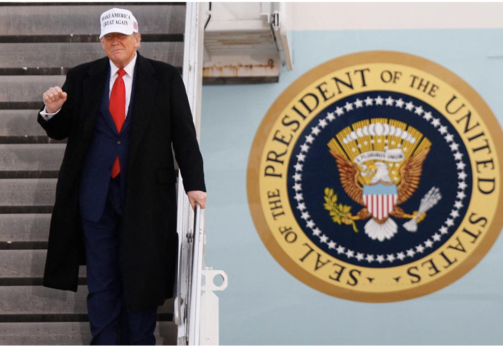 Trump exits Airforce One with US Presidential Seal